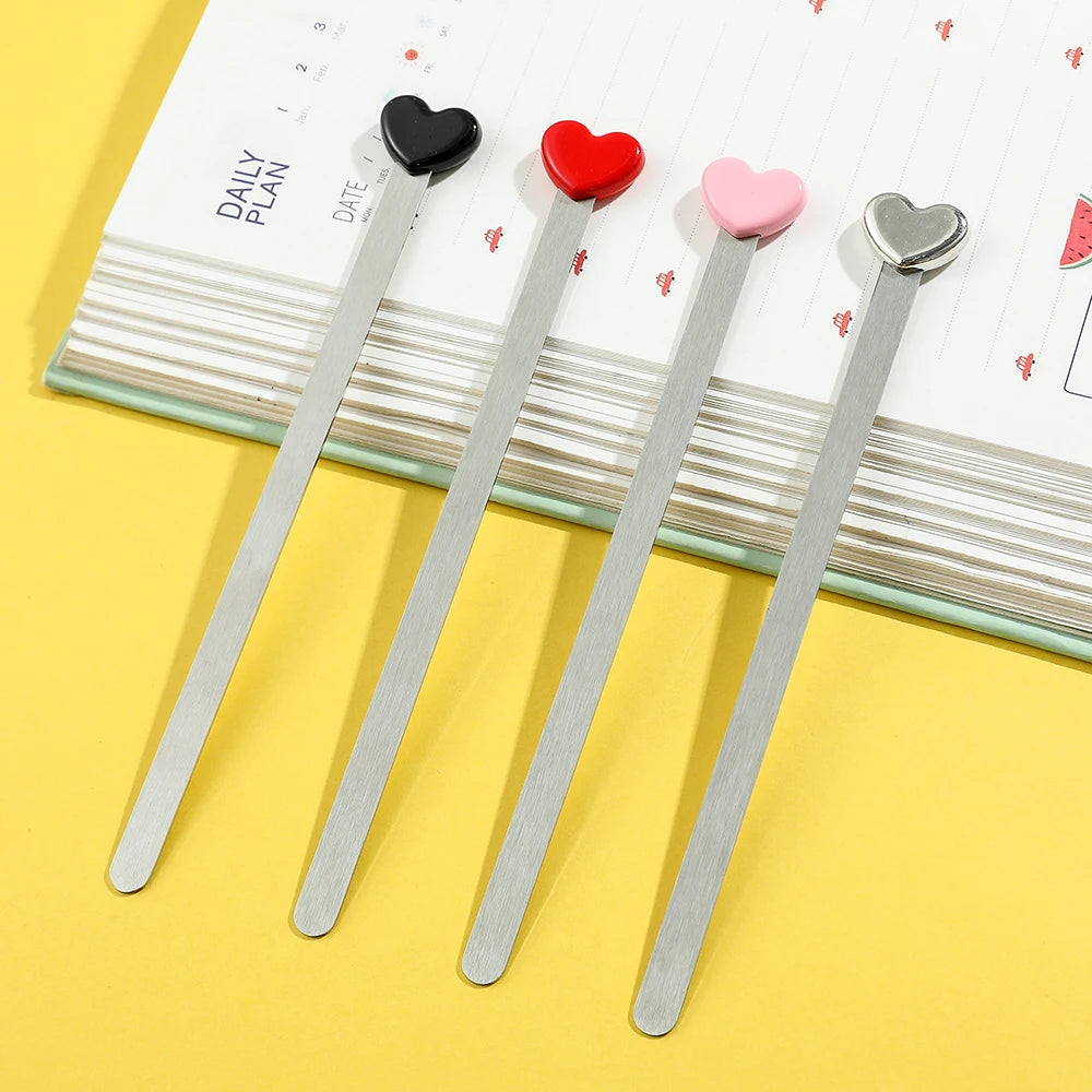 Marcapáginas de acero inoxidable con punta de corazón