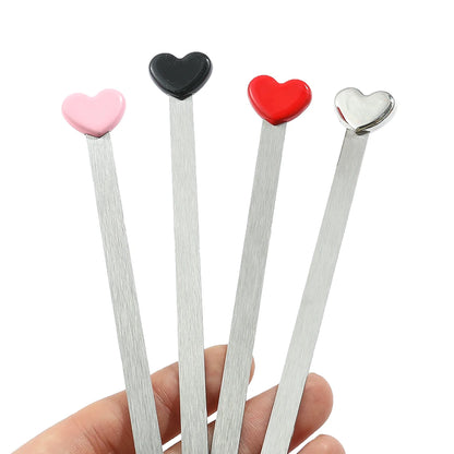 Marcapáginas de acero inoxidable con punta de corazón