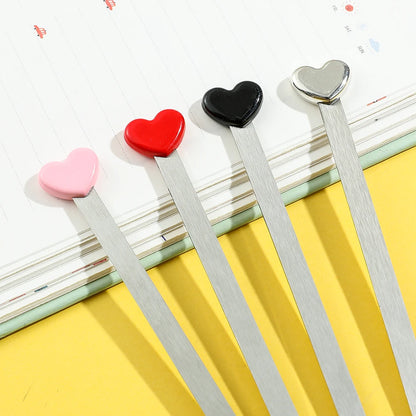 Marcapáginas de acero inoxidable con punta de corazón